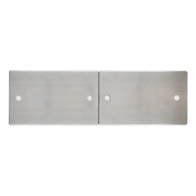 Two metallic flat plates with holes on a white background