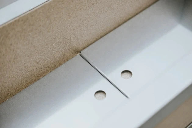 Close-up of silver  Kasai Stainless Steel Air  plates inside a medium wide Kasai Grill.