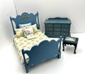 Blue Bedroom Set With Yellow Floral Patterned Bedspread