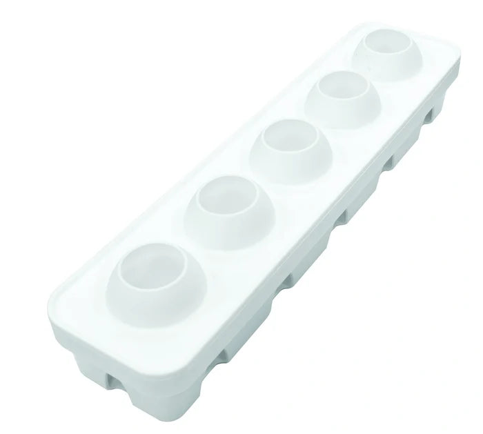 White silicone mold on a white background.