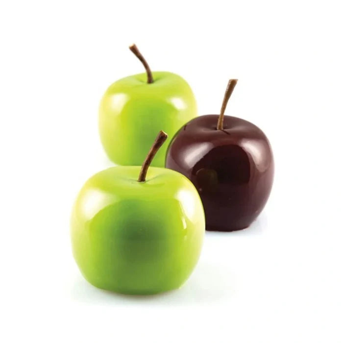 Two green pastry apples and one chocolate-dipped apple on a white background.