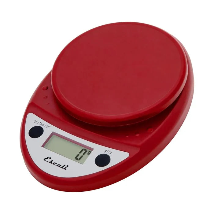 Red digital kitchen scale with a white display on a white background