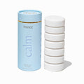 MUSEE Calm Bath Tabs in Water Lily & Linen scent with light blue cylindrical packaging and white tablet stack