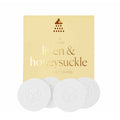 Musee Linen & Honeysuckle shower steamers product packaging with three white circular steamers displayed