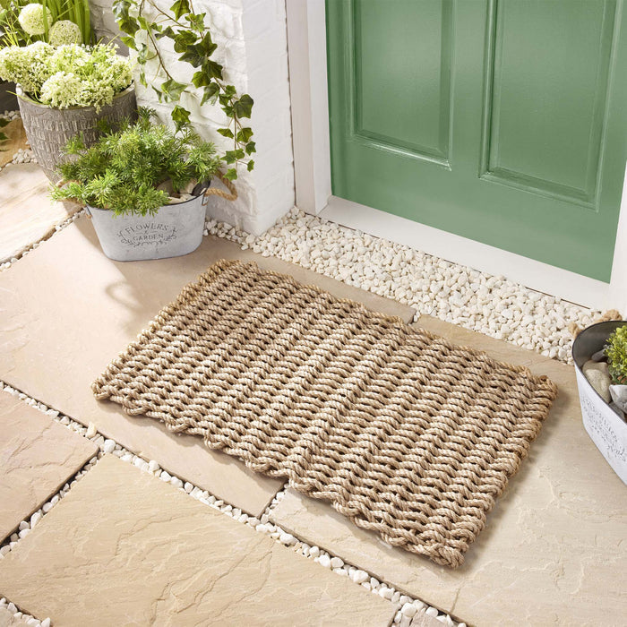 Rope Mat Outdoor Sand. Made from 100% polypropylene featuring a woven rope design.